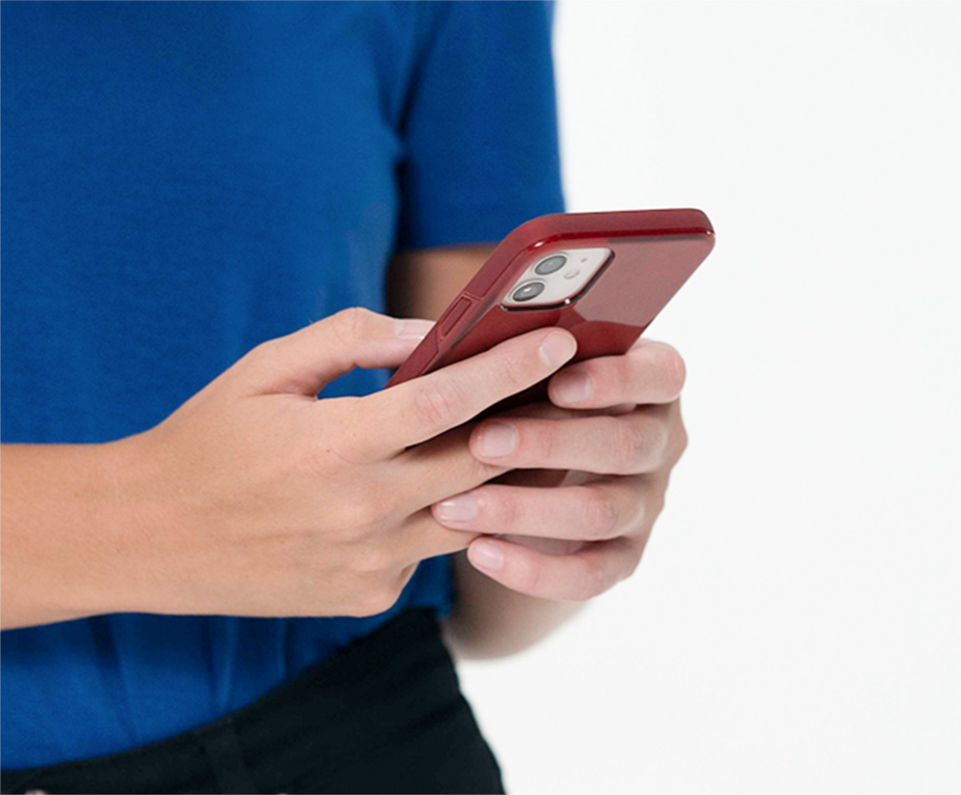 Person holding an iPhone with a red Bravo case.